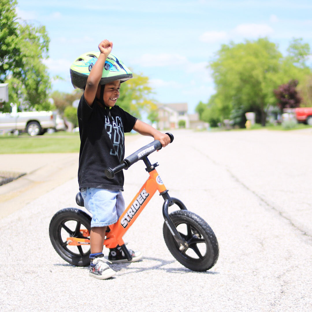 Orange strider shop bike